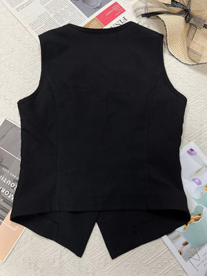 Black tailored sleeveless vest with V-neckline and button-front detail.