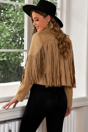 Camel suede cropped western jacket with fringe detail and long sleeves.