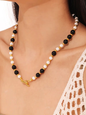 Gold toggle necklace with black onyx and pearl beads