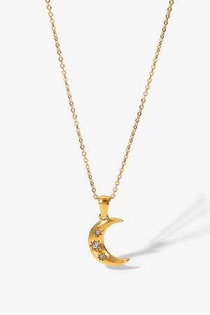 Gold crescent moon pendant necklace with three small star-shaped zirconia accents.
