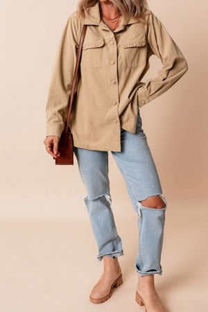 Tan corduroy utility shirt with ruffled chest pockets and buttons.