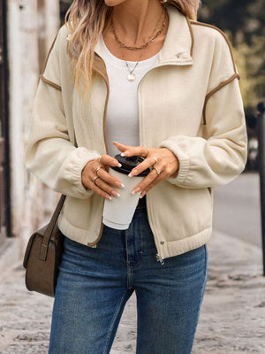 Cream fleece track jacket with contrast trim and zipper closure