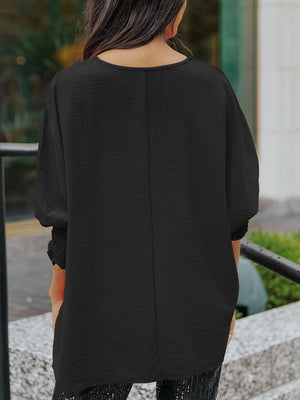 Black textured sleeve blouse with elastic cuffs