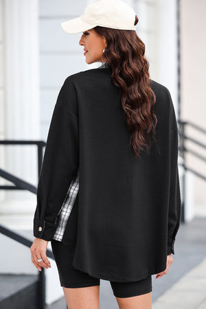 Black waffle knit overshirt with plaid trim detail, button cuff, and relaxed fit.