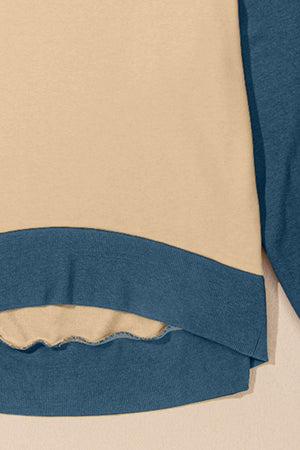 Chic Contrast Crewneck Sweatshirt in tan and blue with a curved hem detail.