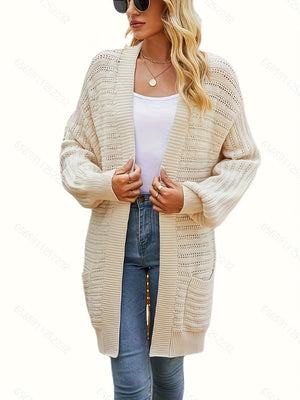 Open knit ivory slouchy cardigan with pockets and a relaxed fit.