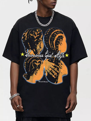 Black oversized cotton tee with bold graphic print of braided hair profiles and text.