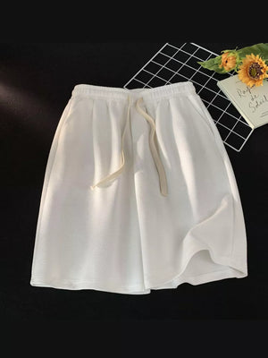 Men's white waffle knit boxer shorts with drawstring waist