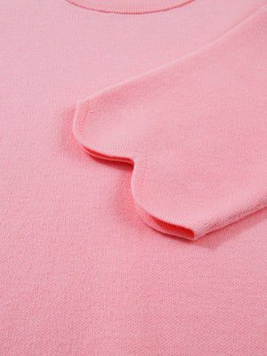 Pink knit sweater with scalloped sleeve detail