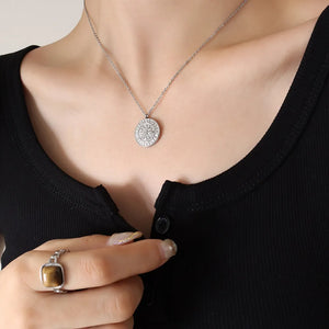 Silver Zodiac Compass Pendant Necklace with celestial design on a delicate chain.