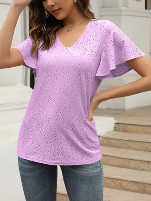Flutter sleeve eyelet V-neck blouse in lilac with allover floral eyelet pattern.