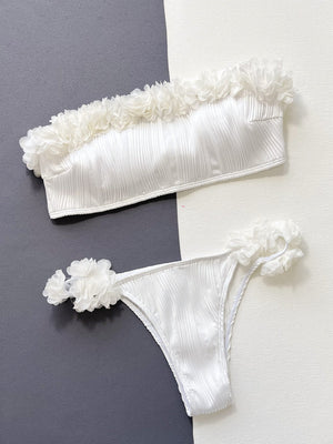 White textured bandeau bikini set with ruffle and floral applique details