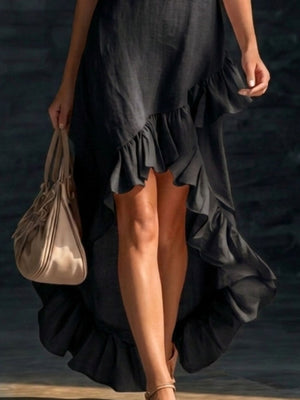 Black high-low ruffle hem dress with asymmetrical ruffled detailing.