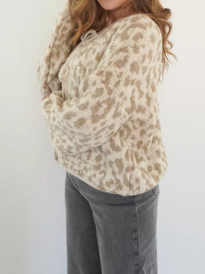 Khaki leopard print tie-front cropped cardigan with long sleeves.