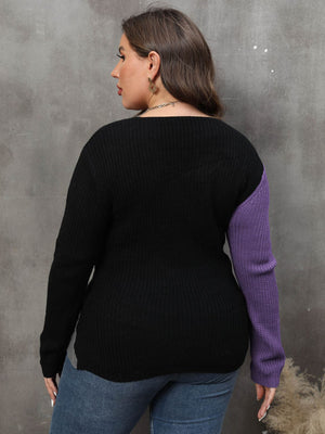 Colorblock acrylic sweater with a bold silhouette in black and violet, featuring a crossover knit detail.