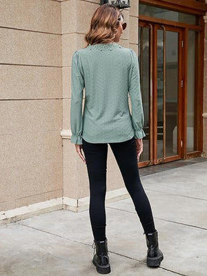 Sage green embroidered eyelet blouse with ruffle cuffs and long sleeves