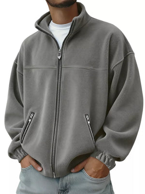 Men's gray fleece zip-up jacket with zippered pockets and stand-up collar.