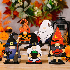 Halloween gnome figurines: witch with black cat, cauldron gnome, pumpkin, ghost, and vampire with candy.