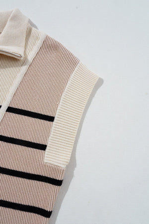 Colorblock ribbed zip-neck mini dress in beige and black stripes with cream trim.