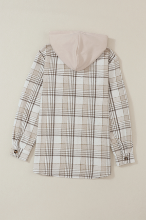 Oversized plaid shacket with attached beige hoodie and button cuffs.