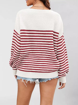 ivory pullover sweater with ribbed cuffs and long sleeve