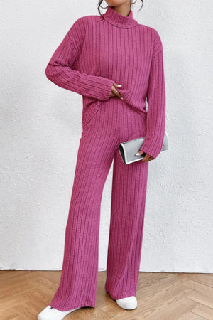 Hot Pink ribbed knit turtleneck loungewear set with wide leg pants and long sleeves.