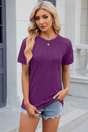 Purple ribbed tee with lace raglan sleeves and pintuck detail on the front.