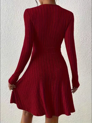 Burgundy ribbed wrap mini dress with long sleeves and an a-line skirt.