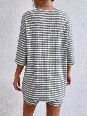 Gray striped two-piece set with elbow sleeve top and shorts.