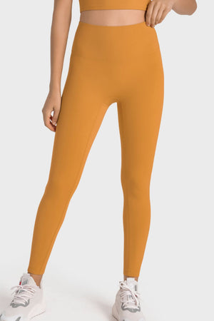 Sculpted seamless high-waist performance leggings in yellow with a fitted silhouette.
