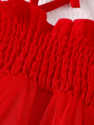 Red smocked bodysuit dress with tulle skirt detail