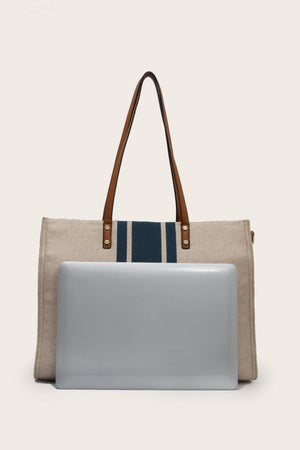 Nautical canvas tote bag in Khaki with navy stripes and brown leather trim.