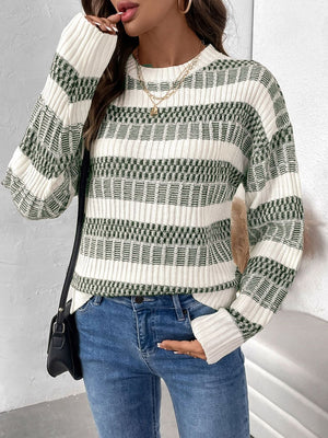 Chic contrast knit pullover sweater in sage with a geometric pattern and crew neck.