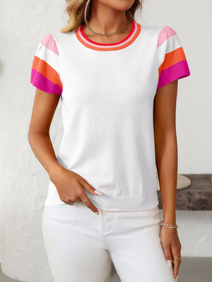White knit top with hot pink, orange, and sky blue colorblock flutter sleeves and striped neckline.