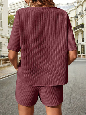 Burgundy waffle knit drawstring co-ord set with short sleeves and shorts.