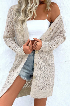 Diamond knit duster cardigan in Dust Storm acrylic with button front and open weave pattern.