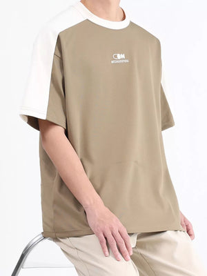 Men's casual t-shirt in Desert Color with white raglan sleeves and contrast stitching detail.