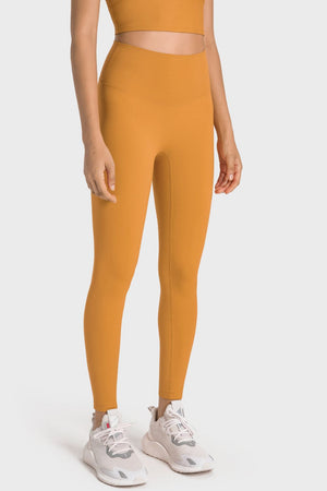 Sculpted seamless high-waist performance leggings in yellow.