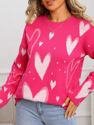 Heartfelt Fuchsia Knit Sweater with all-over white heart pattern, crew neck, long sleeves.