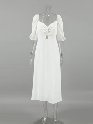 White off-shoulder midi dress with twisted sweetheart neckline and cutout detail
