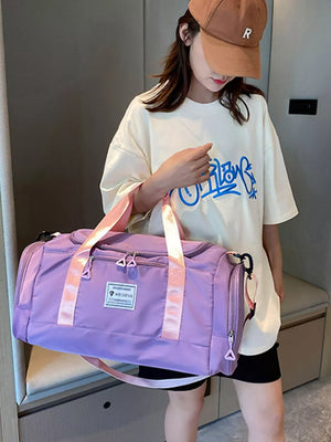 Taro Purple Oxford cloth duffle bag with pink straps and a detachable strap.