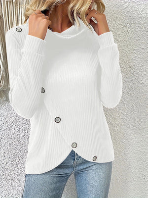 White ribbed turtleneck sweater with asymmetric button detail