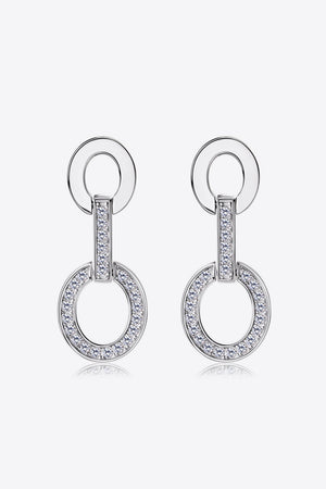 Geometric pavé drop earrings in silver with interlocking circles and crystal embellishments.