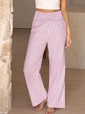 Pink plaid maternity pants with smocked waistband and wide legs.