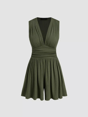 Army green ruched deep V-neck romper with cinched waist and a-line shorts.