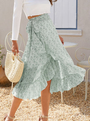 Asymmetric wrap skirt in Gum Leaf with a ruffled hem and tie waist.