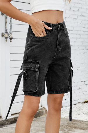 Black denim cargo shorts with side straps and flap pockets