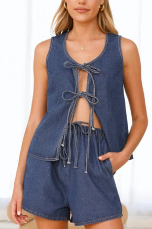 Denim tie-front lounge set in medium blue, featuring a sleeveless top with cutout and drawstring shorts.