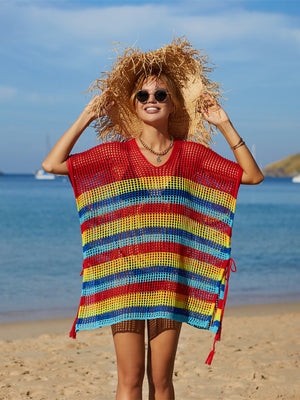 Rainbow stripe crochet beach poncho with V-neck and tie sides.