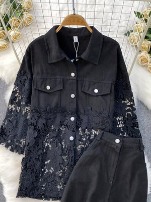 Black lace-embellished two-piece set with button-up collared jacket and matching bottoms.